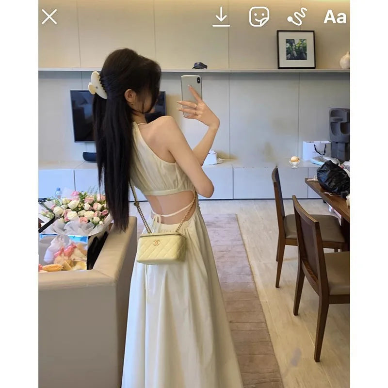 2025 new women's summer French style hanging neck and waist slimming design with exposed waist and sleeveless suspender dress