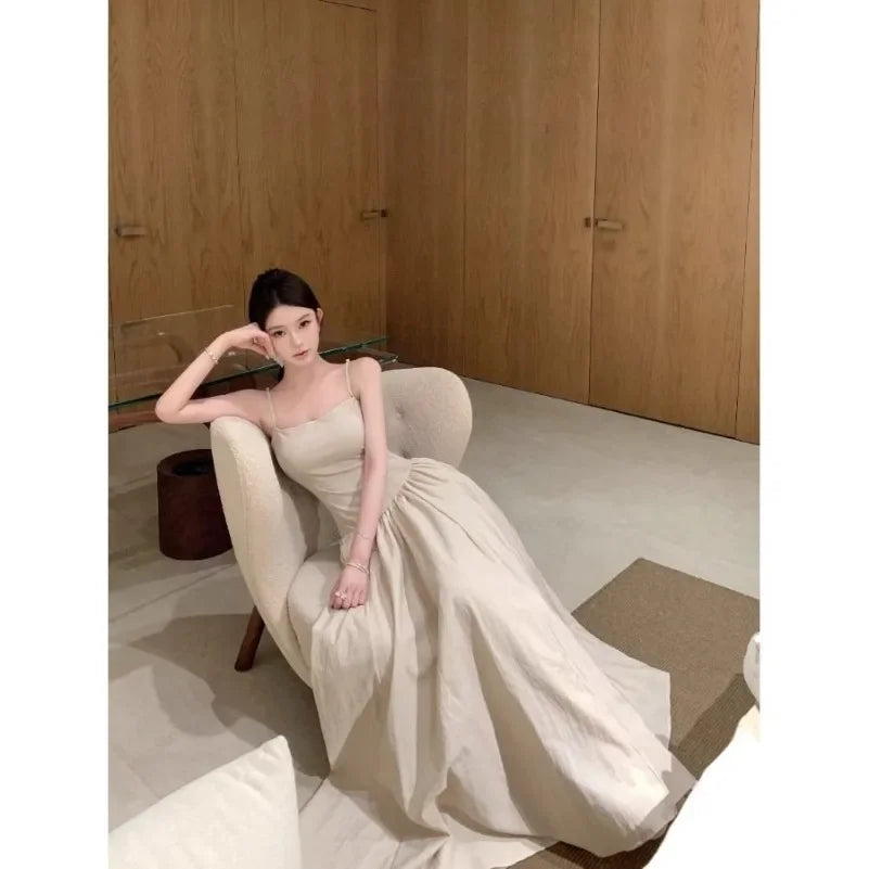New Temperament Apricot Suspender Dress Gentle Summer Vacation Style Waist Cinched Backless  Big Swing A-line Long Skirt   147